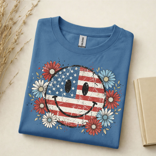 Patriotic smiley face 4th of July t-shirt with red white and blue daisies