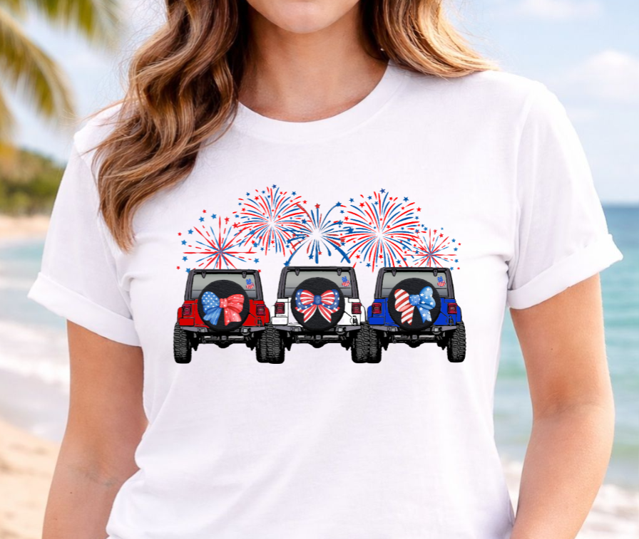 White t-shirt with graphic of three Jeeps and fireworks 