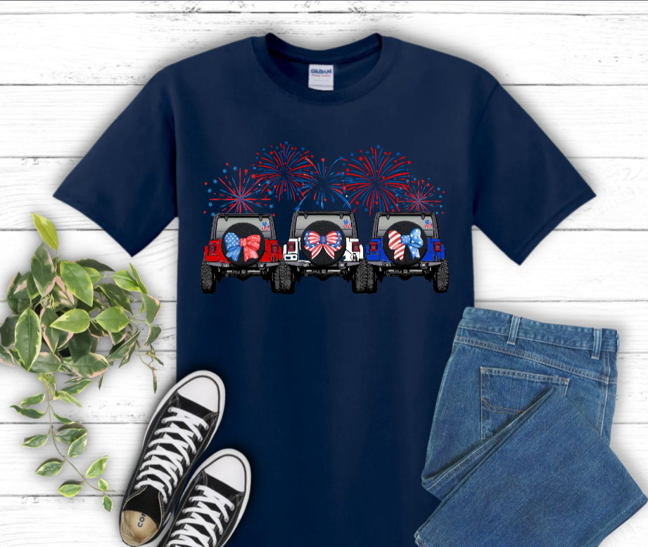 Navy blue t-shirt with graphic of three Jeeps and fireworks 