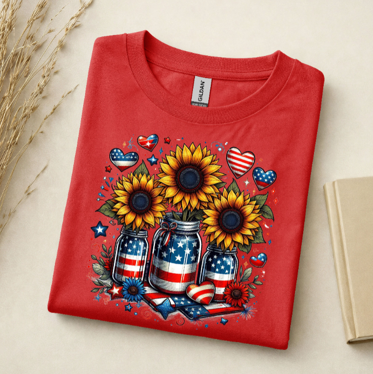 Folded red t-shirt with sunflower and American flag design
