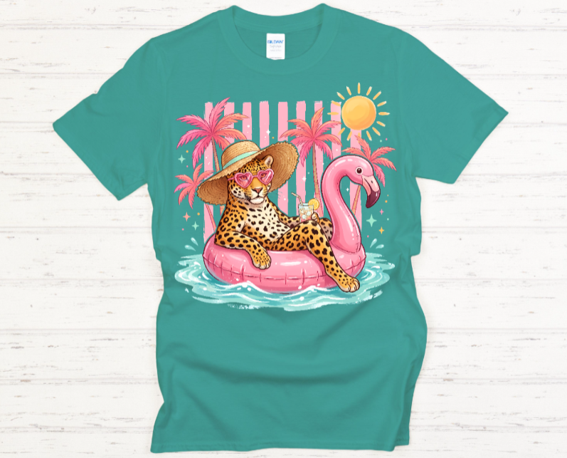 Teal t-shirt with a leopard on a pink flamingo float graphic design.