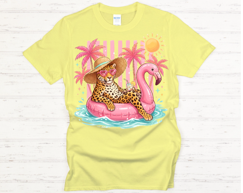 Yellow t-shirt with a leopard on a pink flamingo float graphic