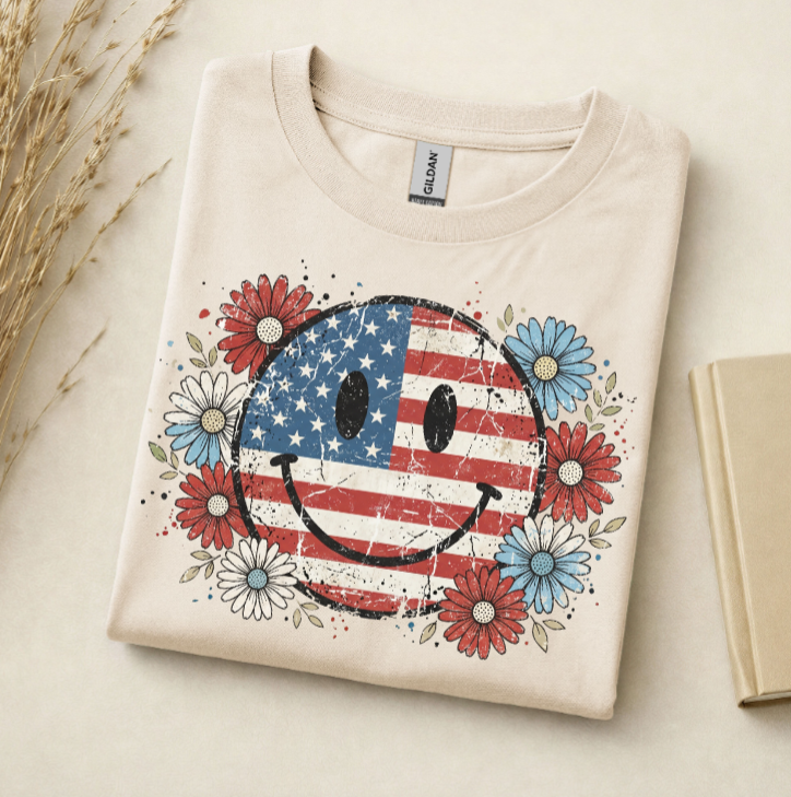 Patriotic smiley face 4th of July t-shirt with red white and blue daisies