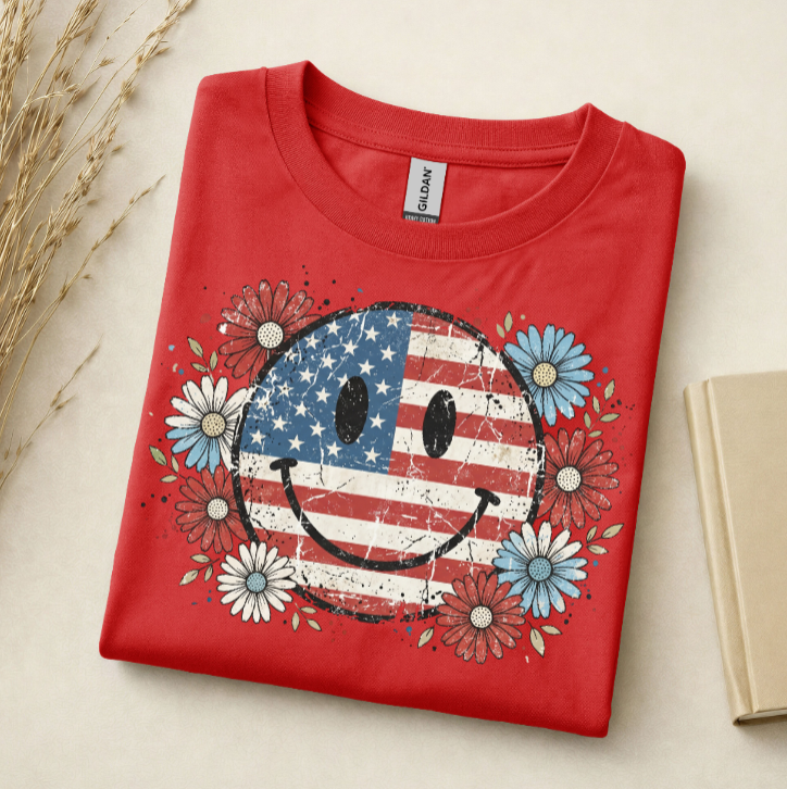 Patriotic smiley face 4th of July t-shirt with red white and blue daisies